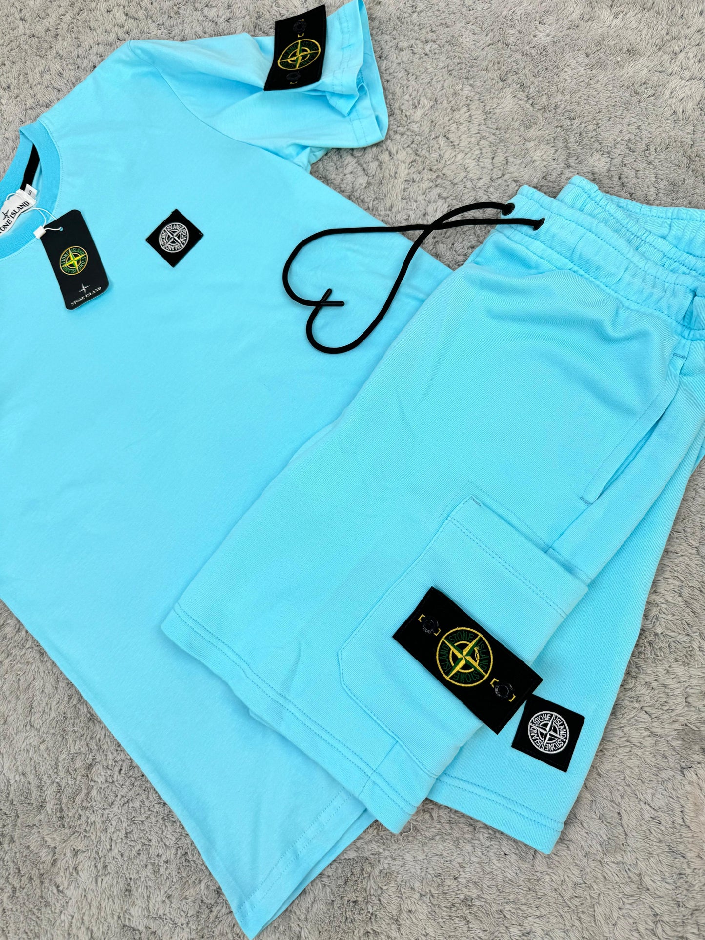 conjunto stone island corto