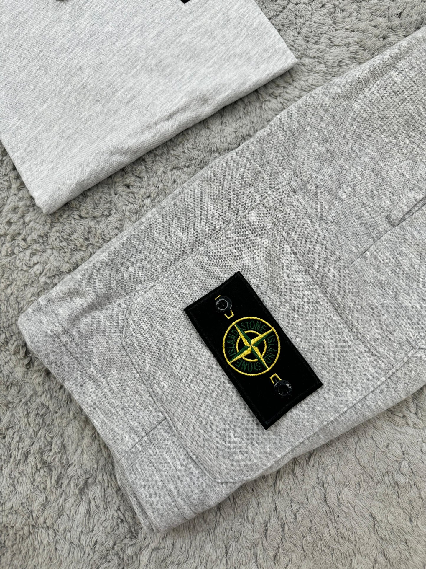 conjunto stone island corto